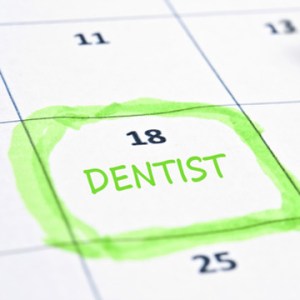Calendar with dentist appointment written on it